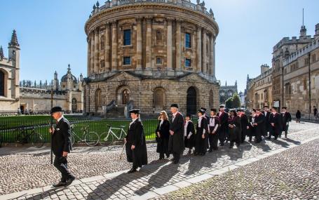Students walking across Jesus College