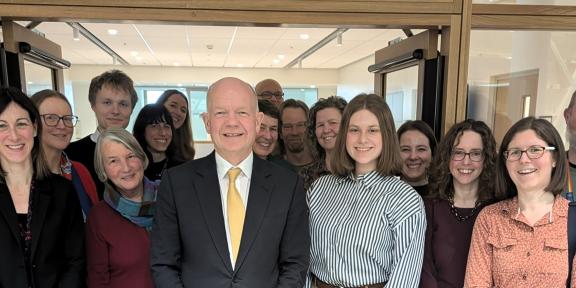 Faculty member with Lord Hague