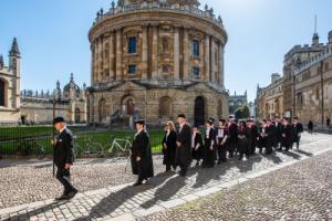 Students walking across Jesus College