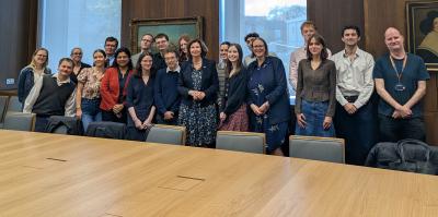 Students and faculty members meeting the Ambassador