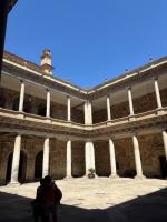 The interior of Salamanca’s Faculty of Philology, with vítores visible on the walls 