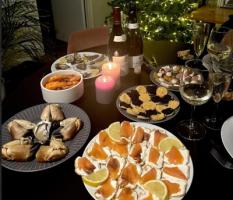 French Christmas meal with wine and candles