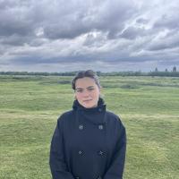 Picture of Georgie Walker standing in a field.
