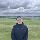 Picture of Georgie Walker standing in a field.